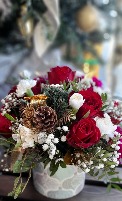 Christmas arrangement in ceramic pot