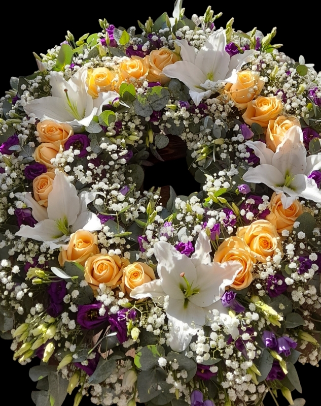 Funeral wreath lilies and roses