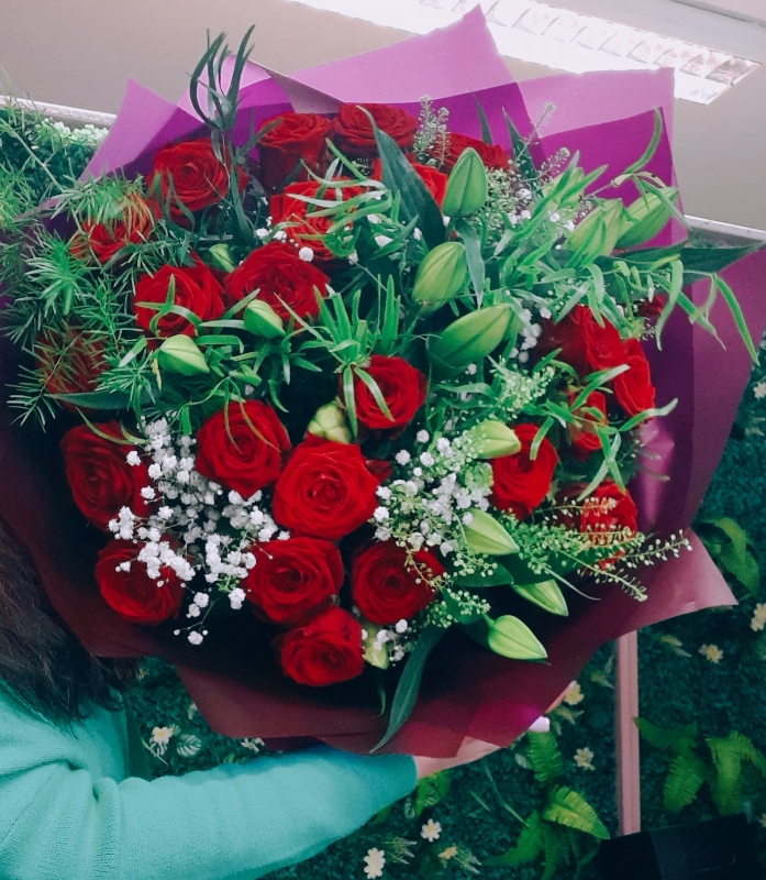 Luxury red roses and lilies bouquet