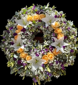 Funeral wreath lilies and roses