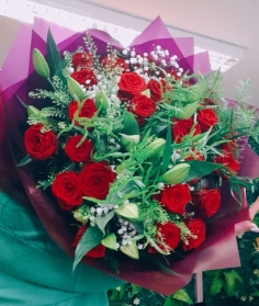 Luxury red roses and lilies bouquet